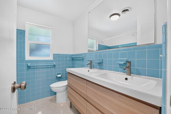 Building Photo - Welcome to this beautifully remodeled 4-bedroom, 3-bath home in the heart of Indialantic Beach!