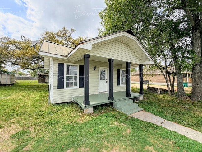 Building Photo - Move-In Ready in Sulphur | Updated 2BR Home w/ Covered Front Porch + Granite Countertops