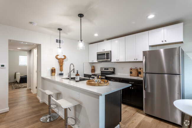 2BR, 1BA - 765SF - Kitchen - Nuvo Sunset