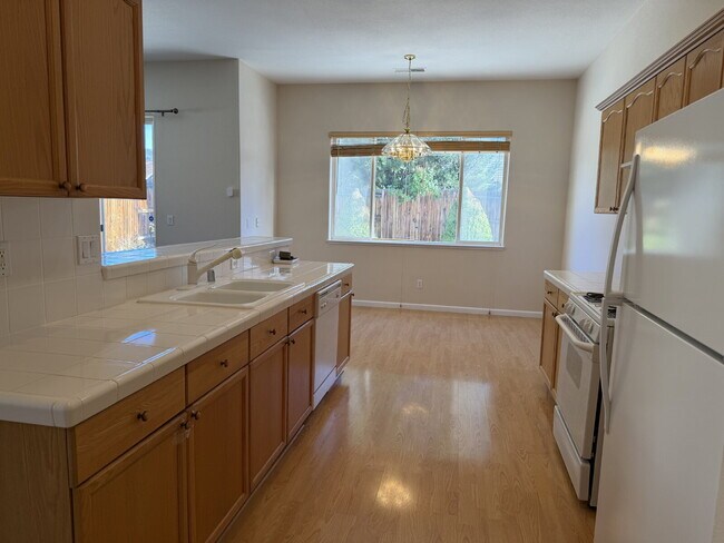 Building Photo - South Reno Home with 4 Bedrooms + 3 Car Garage!