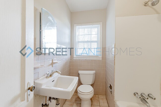 Building Photo - REDUCED! - NOW OFFERING HALF OFF FIRST FUL...
