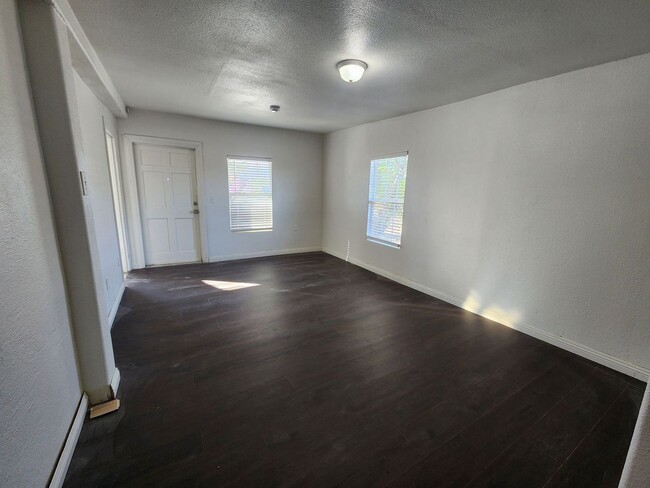 Building Photo - REMODELED 4 BEDROOM 2 BATH WITH 3 CAR GARAGE!