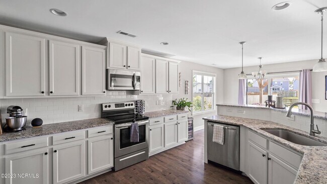 Building Photo - 4BR Home in The Landing at Mill Creek | Bonus Room + Fenced Yard w/ Pergola