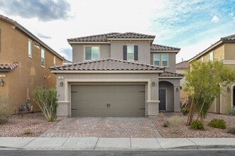 Building Photo - Green Valley!! Gated!! 4 Bedrooms!! Bed & Bath Downstairs!!  TANKLESS WATER HEATER!!! Covered pat...