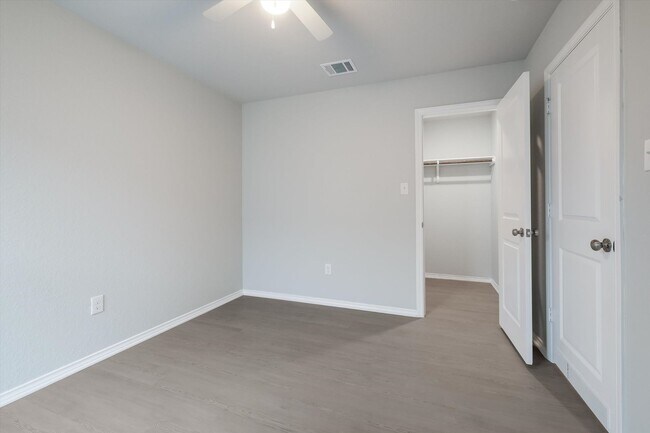 Building Photo - Open-Concept Living with New Flooring