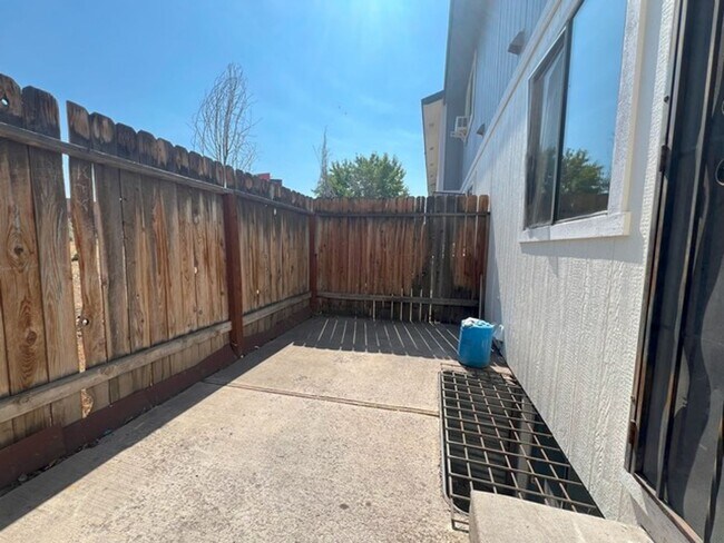 Building Photo - Three Bedroom Two and half Bathroom Tri...