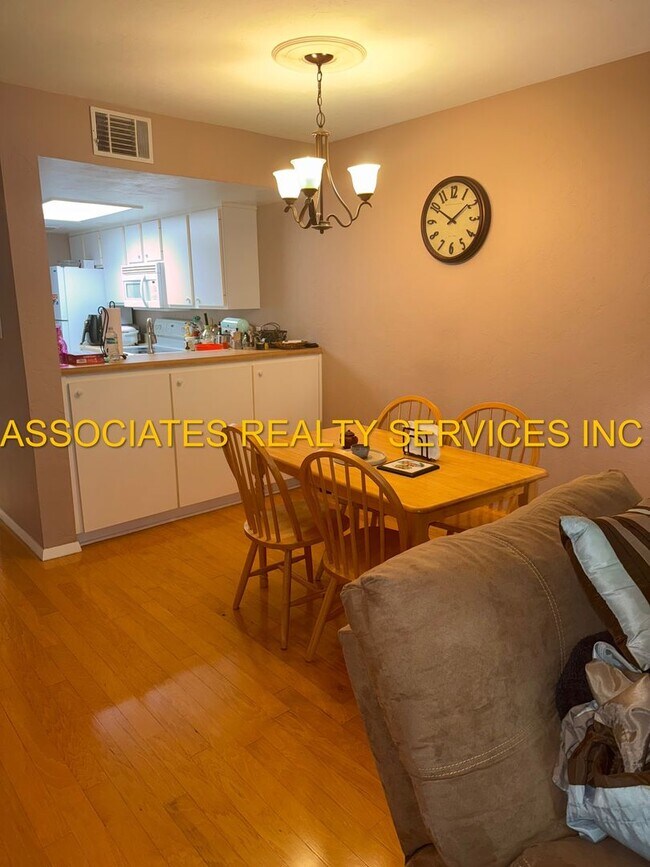 Building Photo - Partially Furnished 2-Bedroom Condo with D...