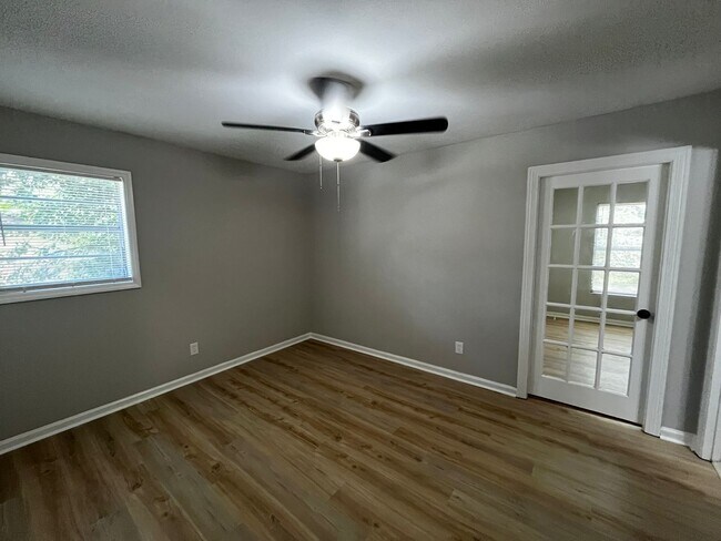Building Photo - Must See the Sunroom off the Primary Bedroom!