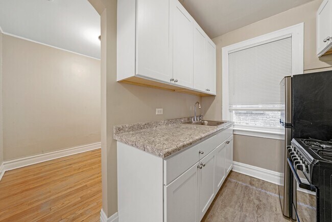 Building Photo - Sunny, Convertible Studio with Two Rooms a...