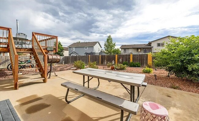Building Photo - Spacious 5-Bedroom Home with Bonus Entertainment Room & Low-Maintenance Yard