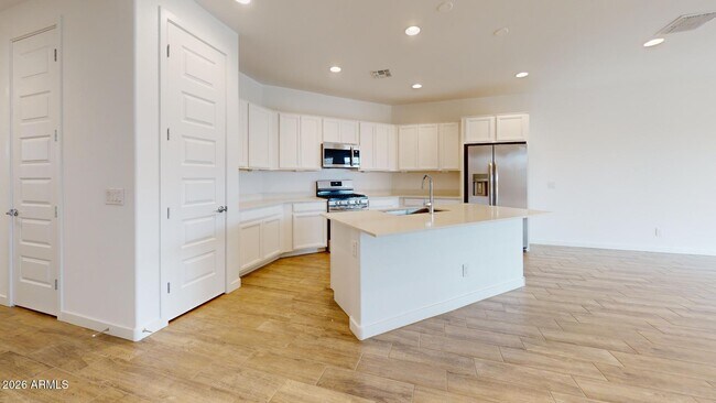 Building Photo - 9332 W Encinas Ln