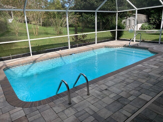 Building Photo - Beautiful Spring Hill pool home