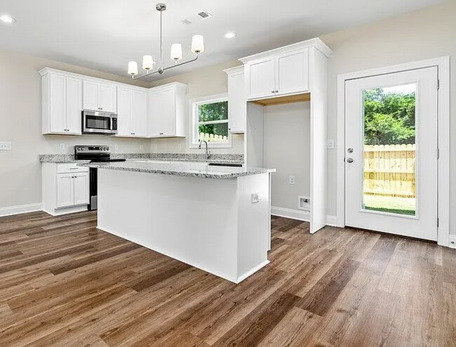 Building Photo - New Townhome in Hartbrook!