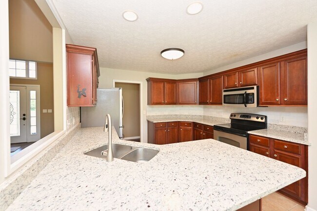 Building Photo - **BEAUTIFUL, WELL-MAINTAINED BRICK HOME ON A LOVELY 0.63-ACRE LOT IN A DESIRABLE NEIGHBORHOOD**