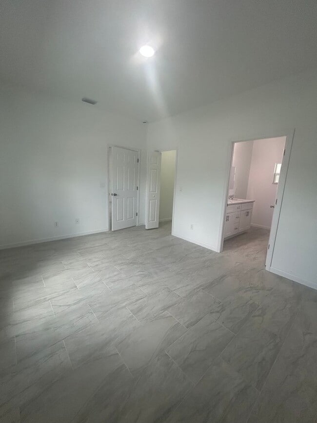 Building Photo - JUST BUILT! Modern 3 Bed / 2 Bath Home with Garage in Serene Lake Placid