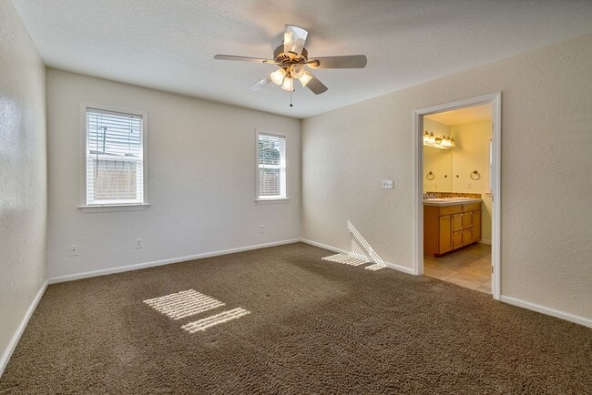 Building Photo - 3BR + Office Home in Excellent Condition with Storage Sheds and Garage Workspace!