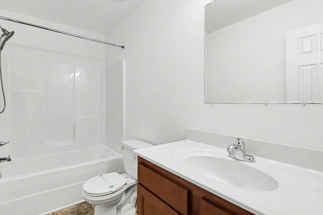 Building Photo - 4-bedroom, 2.5 bath with wooded view!