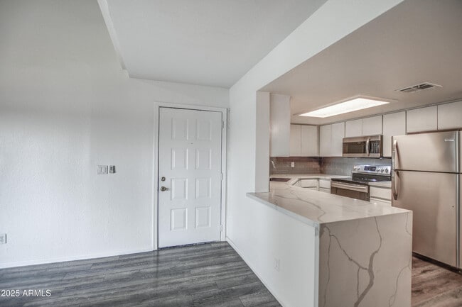 Building Photo - 4850 E Desert Cove Ave