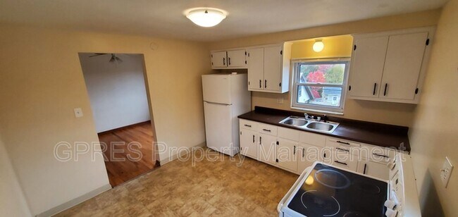 Building Photo - 5706-5708 Poketa Rd.