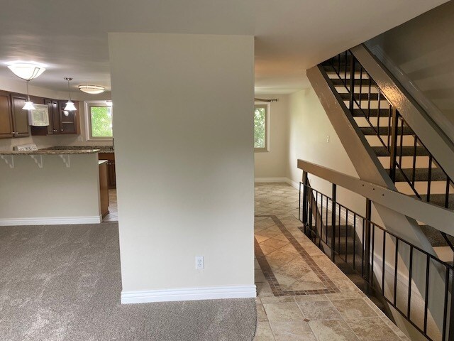 View from living towards kitchen & kitchen dinning area. - 411 E Highline Cir