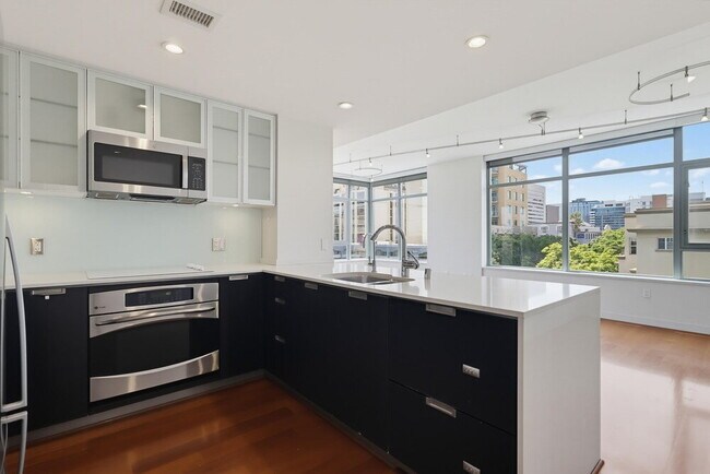 Building Photo - Skyline Views & Sophisticated Corner Living at Aria in Cortez Hill