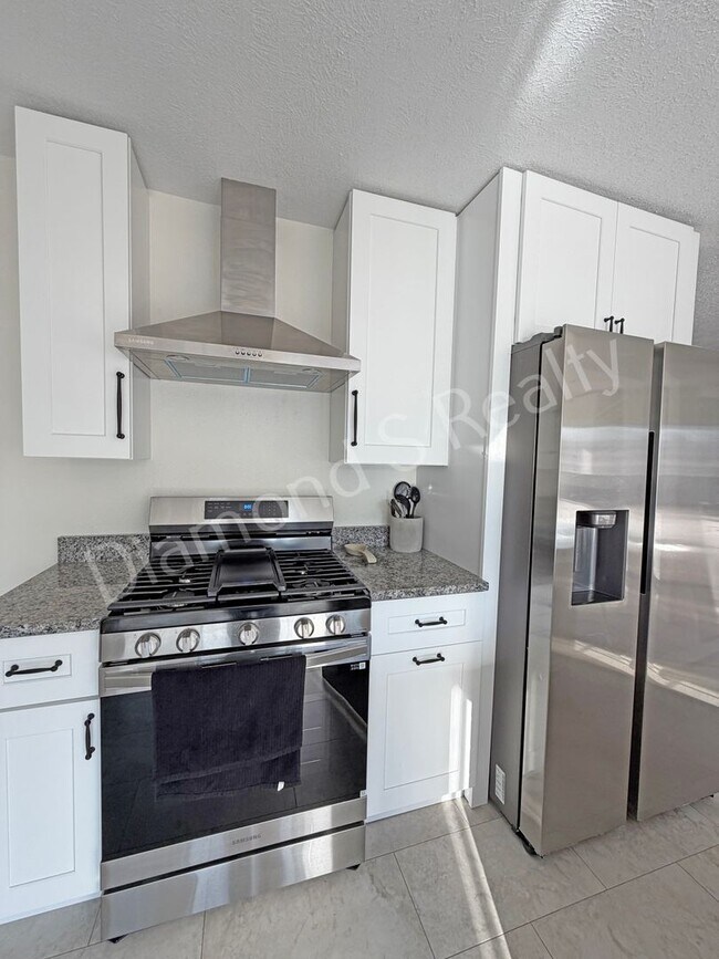 Building Photo - Stunning 3_Bed Home with Two Primary Suites & a Pool!