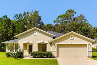 Building Photo - 7114 Tarpon Ct