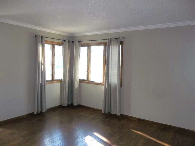 Building Photo - $500 OFF First Month | Charming 2BR Townhome with Garage
