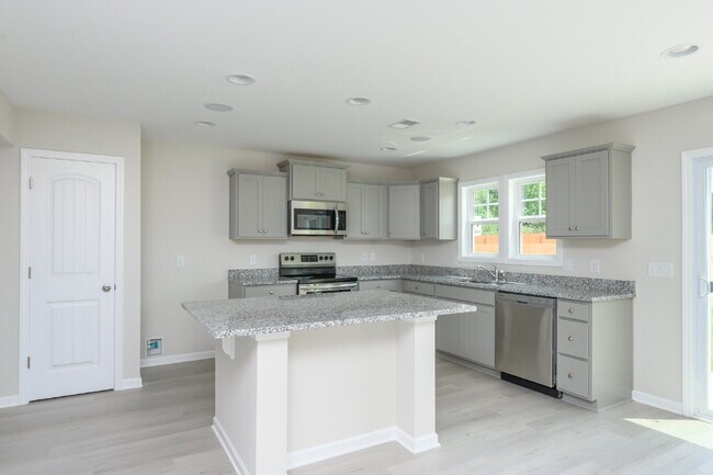 Building Photo - Elegant 4 Bedroom, 2 Bathroom Home with Modern Finishes & Open-Concept Living $2,150/mo rent