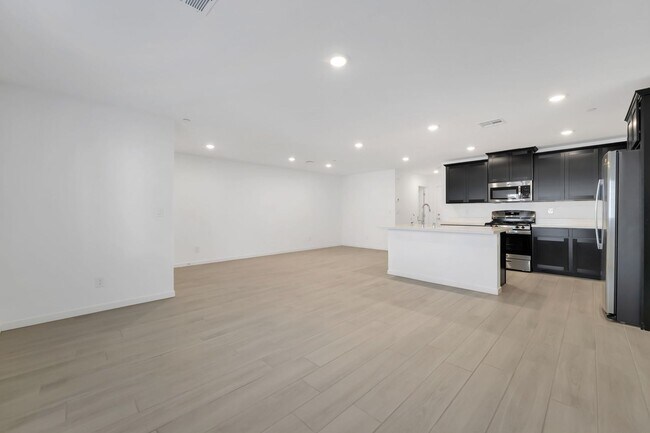 Building Photo - Modern Cadence Townhome with Sleek Finishes & Open-Concept Living!
