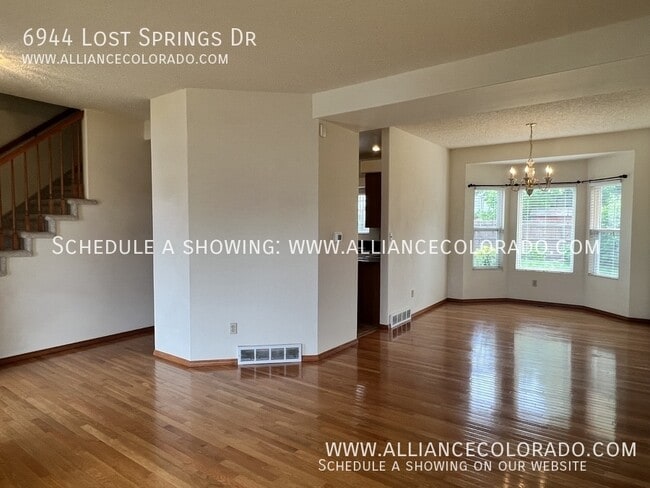 Building Photo - 6944 Lost Springs Dr