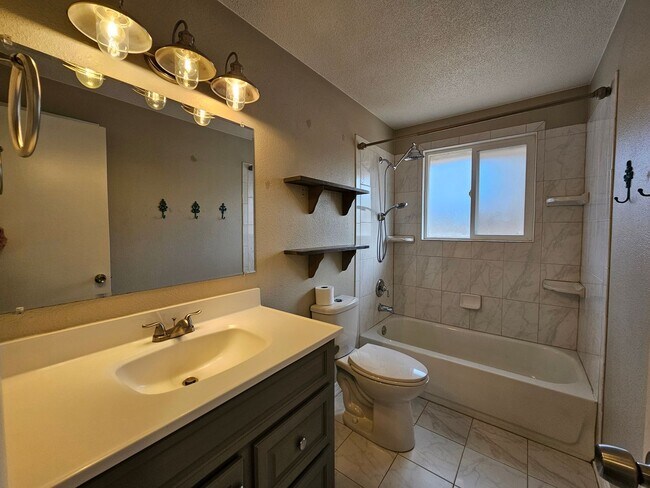 Building Photo - Welcome home to this maintained 4-bedroom, 2-bath Home in 80909!