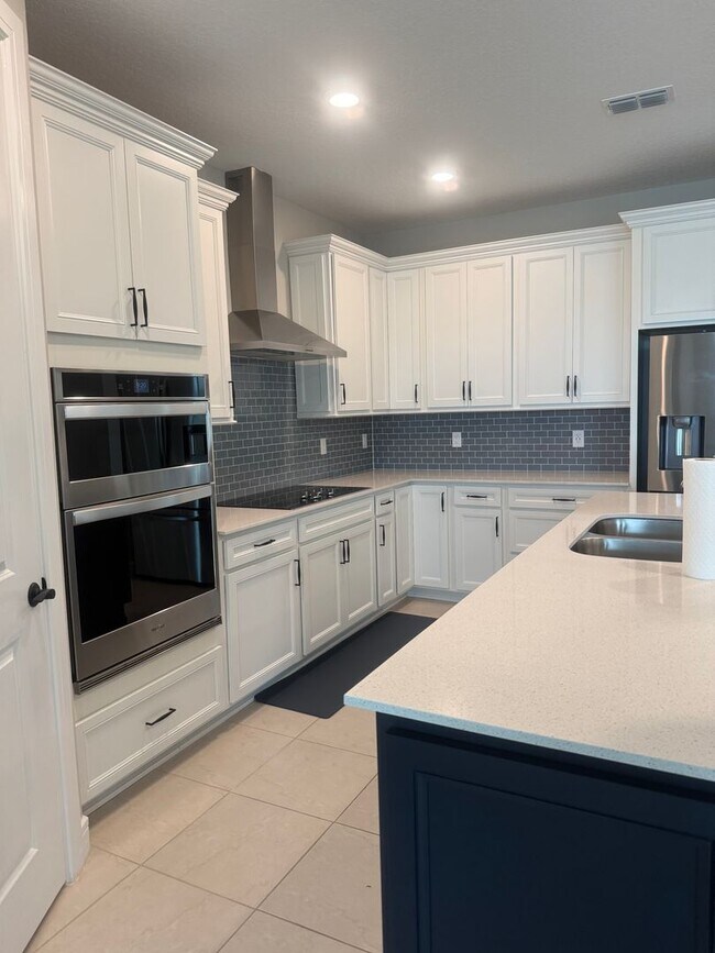 Building Photo - Lakeview Living with Bonus Flex Space & Resort-Style Amenities