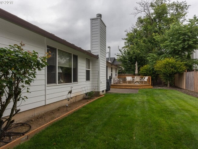 Building Photo - Charming 4-Bed, 2-Bath Home with Vaulted Ceilings, Dual Fireplaces & Serene Outdoor Spaces