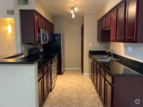 Building Photo - 2 Bedroom - 2 Bath 920 Sq. Ft. Condo in Be...