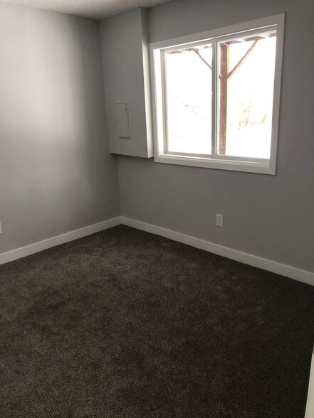 Basement bedroom which is connected to the half bathroom - 6224 Magnolia Ln N