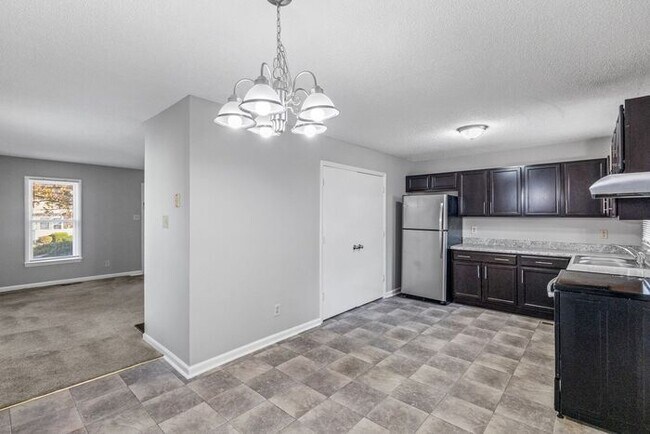 Building Photo - NE Home - Updated Kitchen and Bathrooms! SS Appliances, Fire Place, Front Porch & Deck, Fenced Yard!