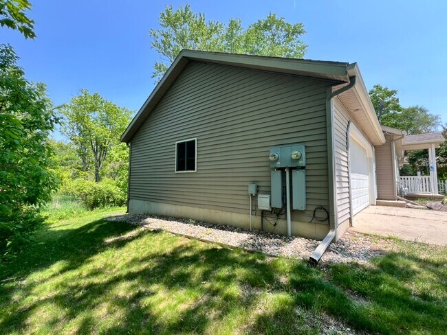 Building Photo - Spacious 3BR Duplex with Finished Basement & 2-Car Garage in Otsego