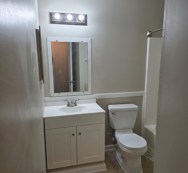 Building Photo - Corner Lot Charm: Spacious 4 Bed on Corner Lot w/ Custom Bookshelves & Private Storage Shed