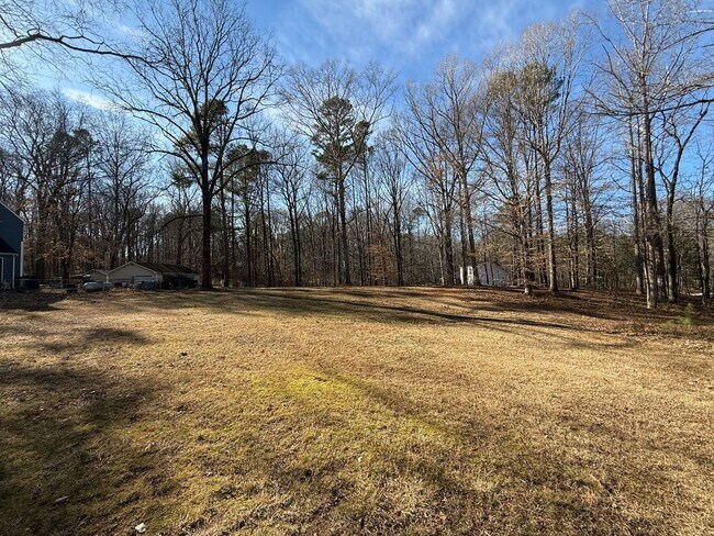 Building Photo - Charming 3BD, 2.5BA Willow Spring Home on a Corner Lot with a 2-Car Garage and a Large Fenced Bac...