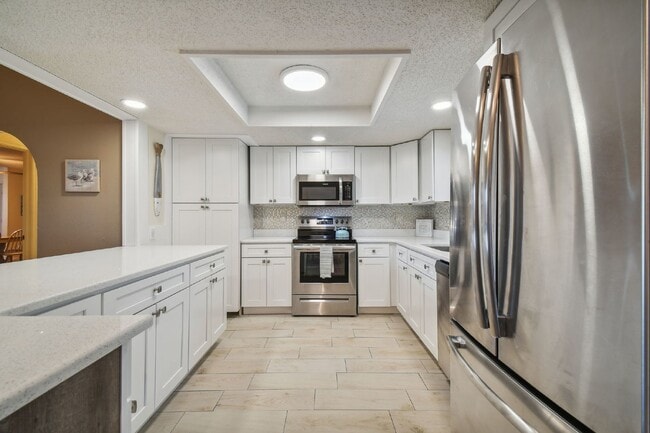 Building Photo - ***PRIVATE HEATED POOL*** Beautiful, Fully-Furnished 3-Bedroom Home Available April 1, 2026!   **...