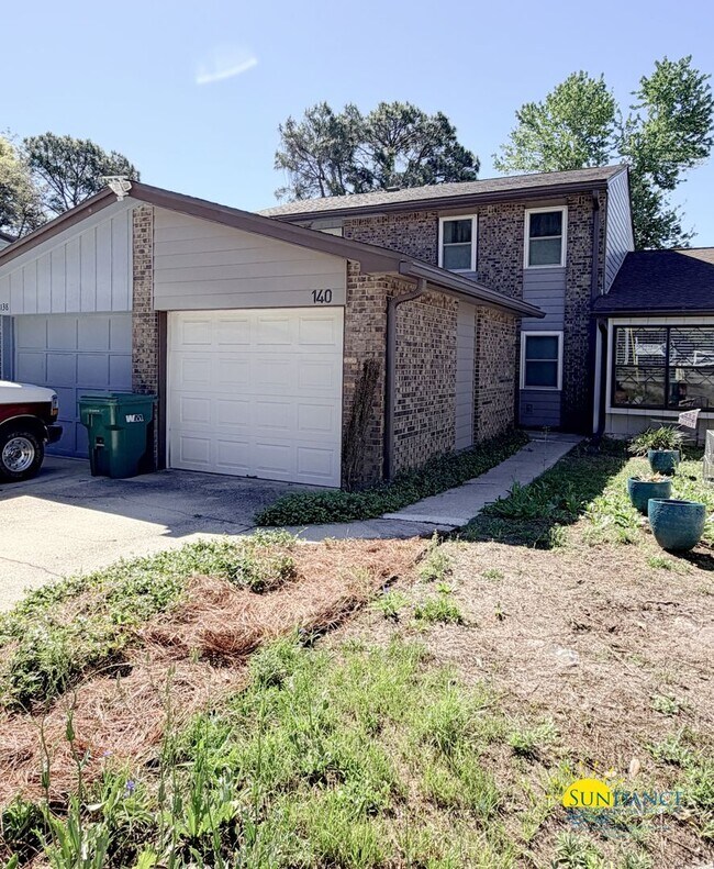 Building Photo - Charming 2BR townhome just steps from beautiful Cinco Bayou in Fort Walton Beach!