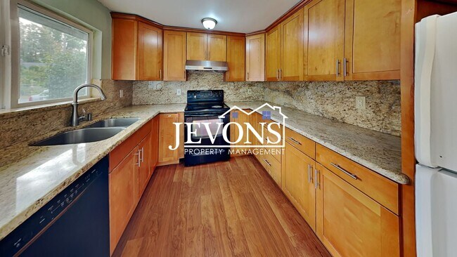 Building Photo - $1,000 Rent Credit if move-in occurs befor...