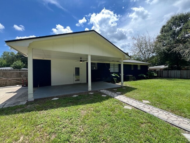 Building Photo - Updated 3BR | Solar Panels + Fenced Yard