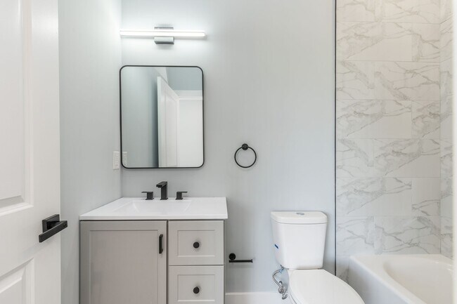 Building Photo - New 2 Bedroom Apartment in Modern Building! Now Offering 1 Month FREE on a 12 month lease!