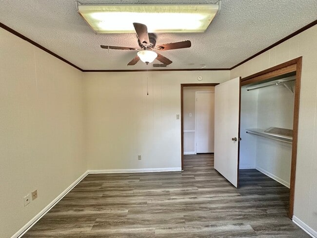 Building Photo - Spacious 4-Bedroom Home on a Corner Lot wi...