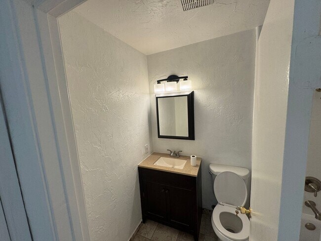 Building Photo - Two-Story 2 Bedroom, 1 Bath Lakeside Condo with Solar!