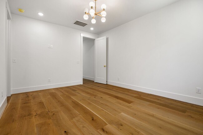 Building Photo - Modern 4-bedroom, 4-bathroom Custom Home D...