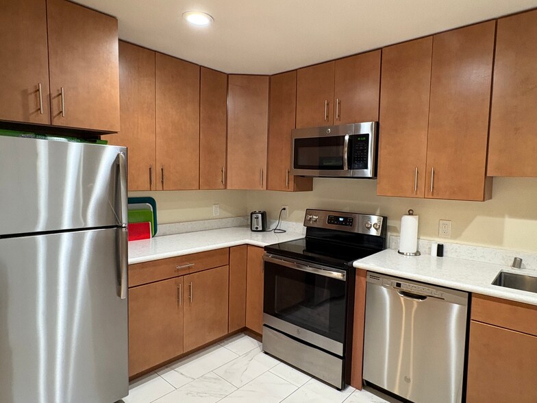 Kitchen with stainless steel appliances - 1912 Euclid Ave
