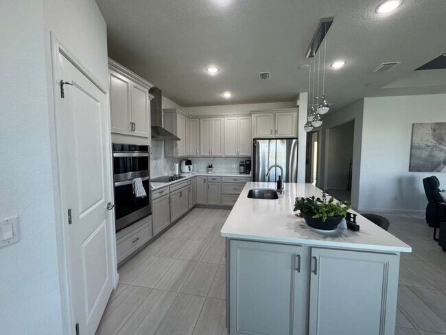 Building Photo - Modern 3-Bedroom Home with Pool and Lake View